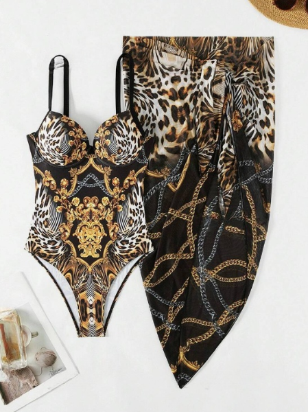 Versace-inspired black, white, and gold one-piece with a matching mesh shirt